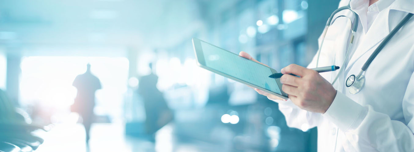 industry solutions, vertical markets, medical staffer with tablet, Doing Better Business